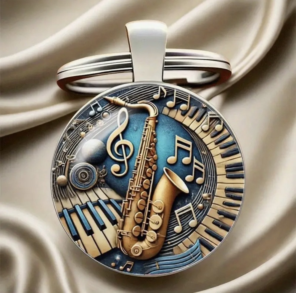 3/$25 Saxophone Surrounded By Piano Keys Musical Notes Treble Clef Keychain NEW